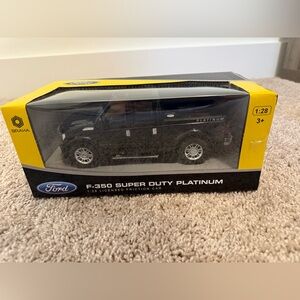 New in box, Ford F-350 Super Duty Platinum Black Model Truck, never opened